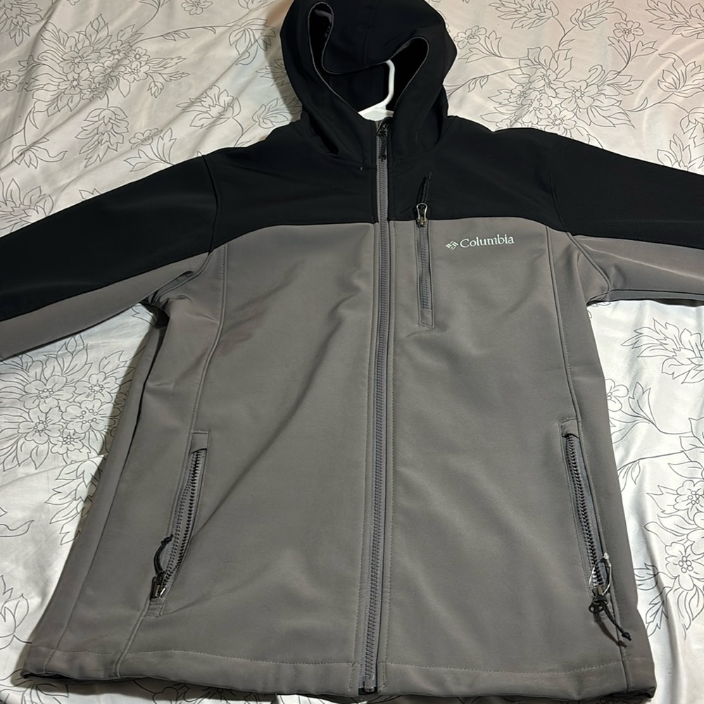 This is a grey Columbia rain jacket i barley used it only like once